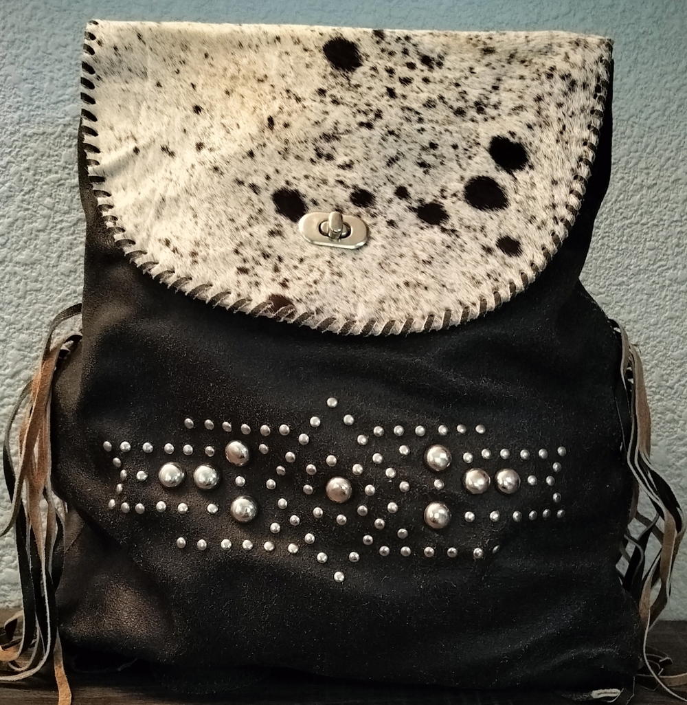 Large Black Leather Backpack with Spotted Cowhide Flap and Stud Detail